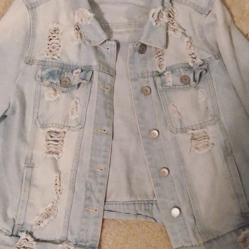 Woman’s light wash jean jacket